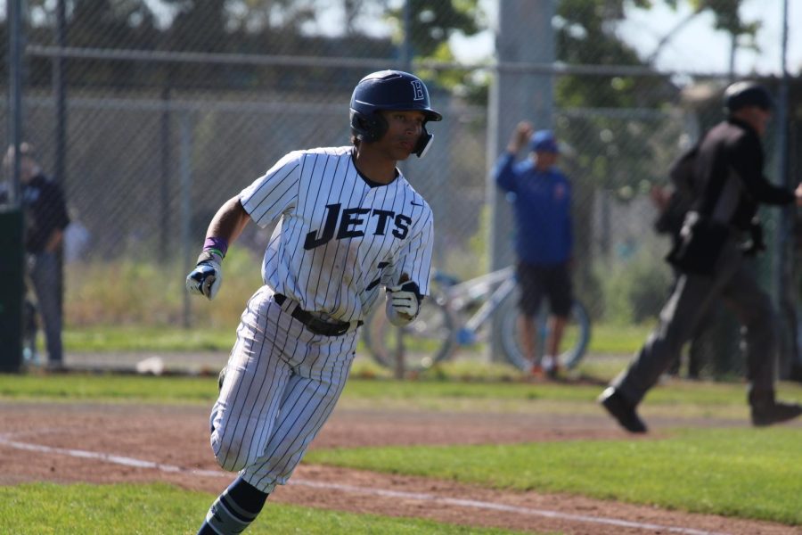 Sophomore Anthony Wilson advances to first base in the first inning of the WACC Championship.