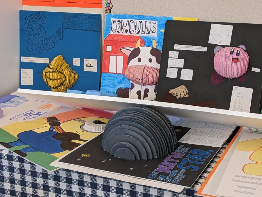 Math projects created by Lacaba's students. Lacaba's classroom is also full of HOCO decorations that students have worked on over the years.