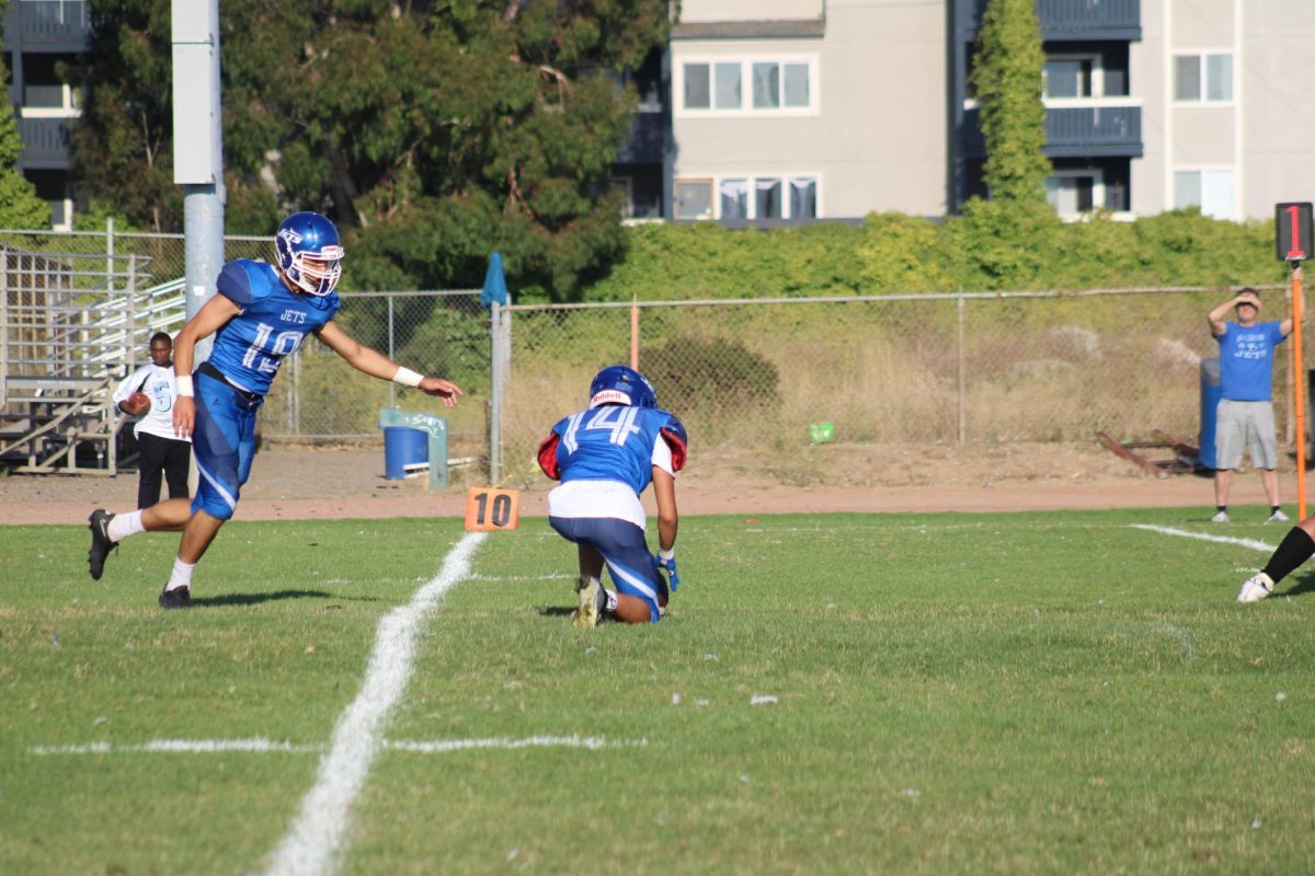 Junior Charles Snell lines up for an extra point on August 25, 2023.