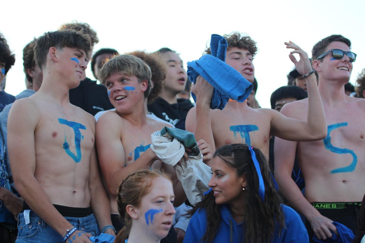 Seniors Finn Little and Jonah Abrami show off their school spirit.
