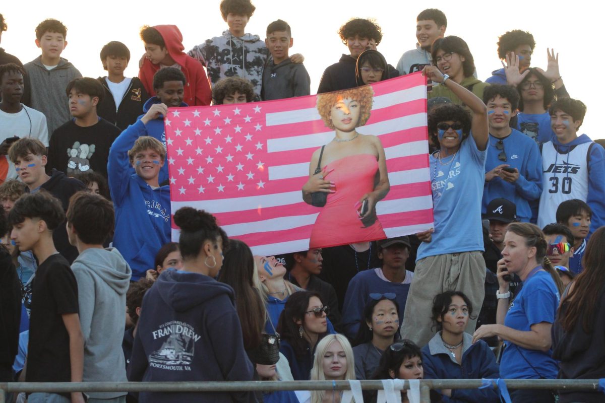 Encinal's student section reveals an Ice Spice flag.