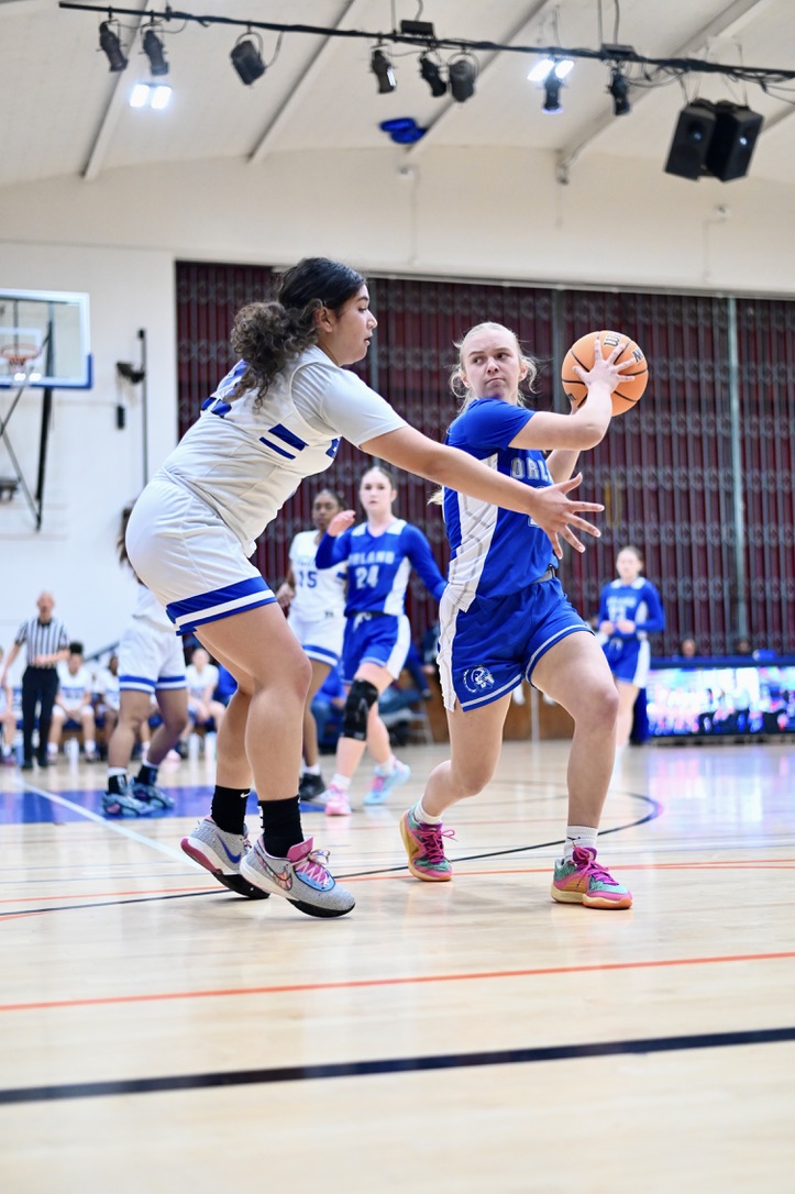 Encinal senior Jazzy Alcantal attempts to defend Orland opponent on March 6, 2025.