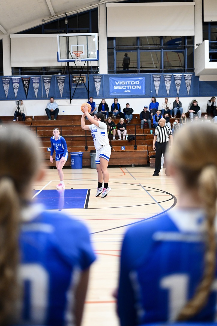 Encinal senior Jazzy Alcantal shoots a free-through after a foul delivered from Orland High on March 6.