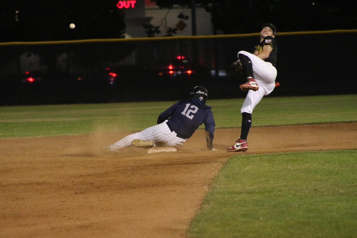 Senior Oskar Jones steals 2nd base during WACC Championship against the Castro Valley Trojans to rally the Jet energy at top of the 5th inning on May 15th.