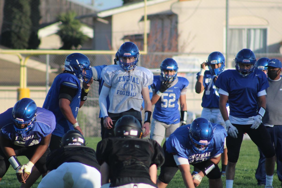 Quarterback Garrett Deatherage surveys the line of scrimmage. The 2020 Island Bowl was cancelled due to the COVID-19 pandemic. It was the first time the game was cancelled in 65 years. However, Encinal and Alameda scrimmaged in March of 2021.