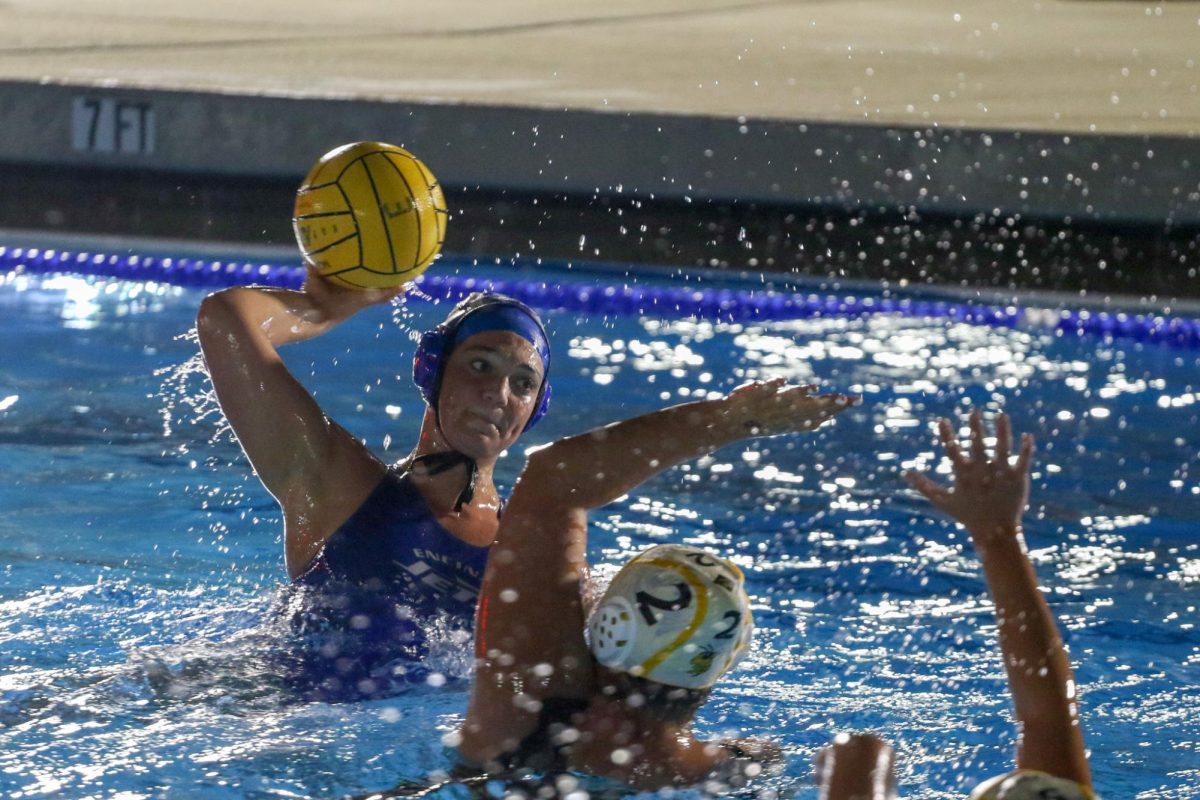Hannah Reid holds possession under pressure.