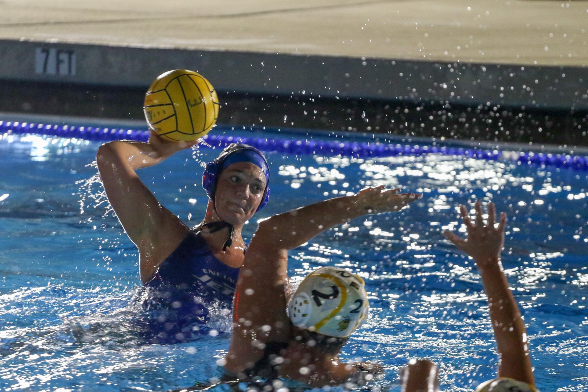 Hannah Reid holds possession under pressure.