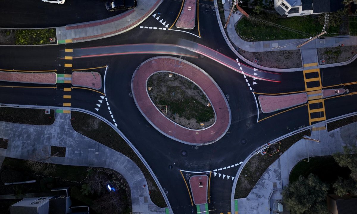 Cars pass through the traffic circle at the intersection of Central Ave and 3rd St on Jan. 19, 2026.