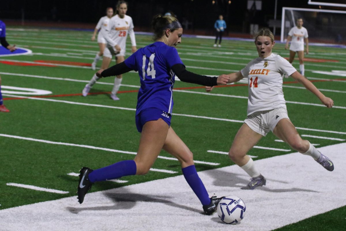 On Jan. 13 against Berkeley, Emma Hernandez (11) saves the ball from going out of bounds