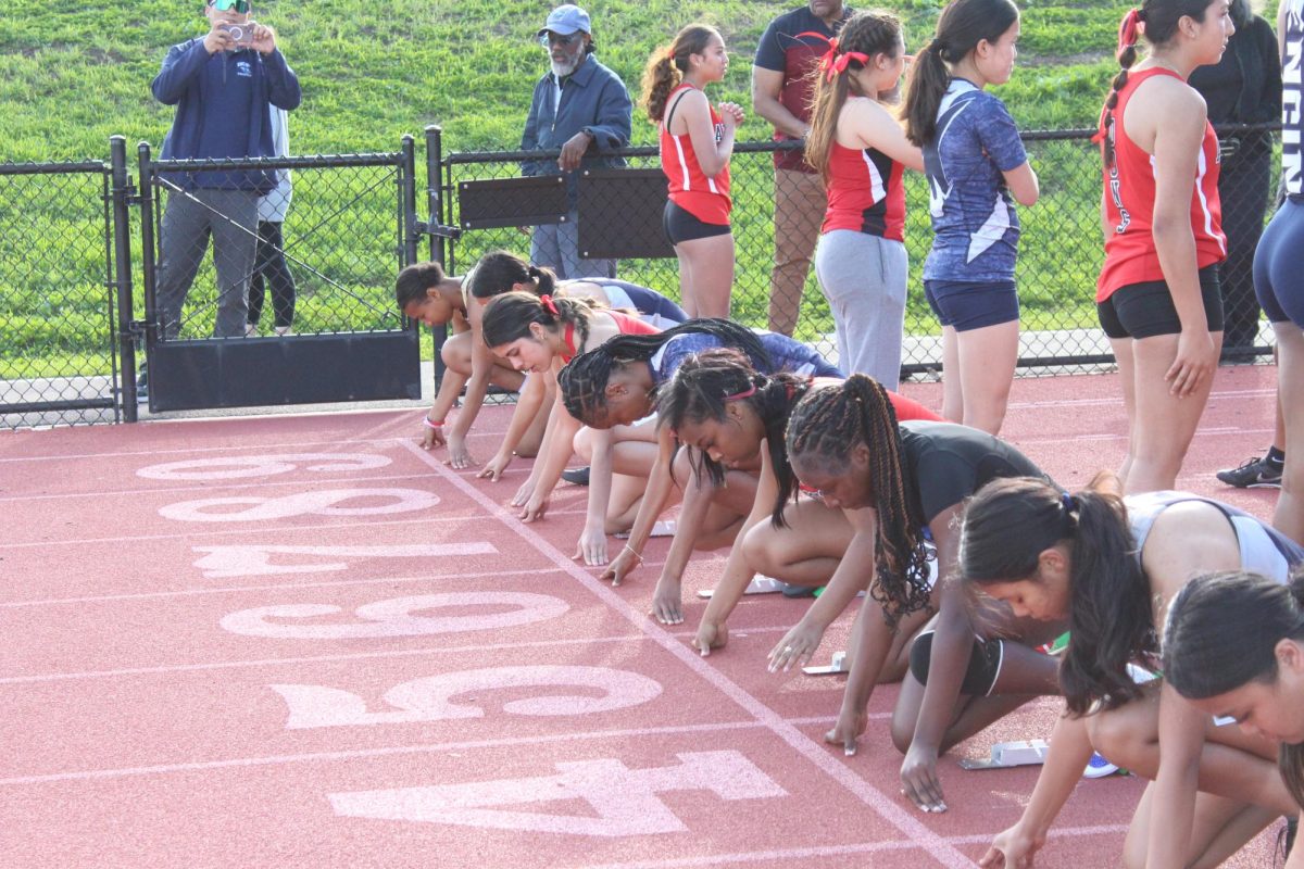Varsity women's track prepares to run the 100m on Mar. 26, 2025 at Tennyson High School.