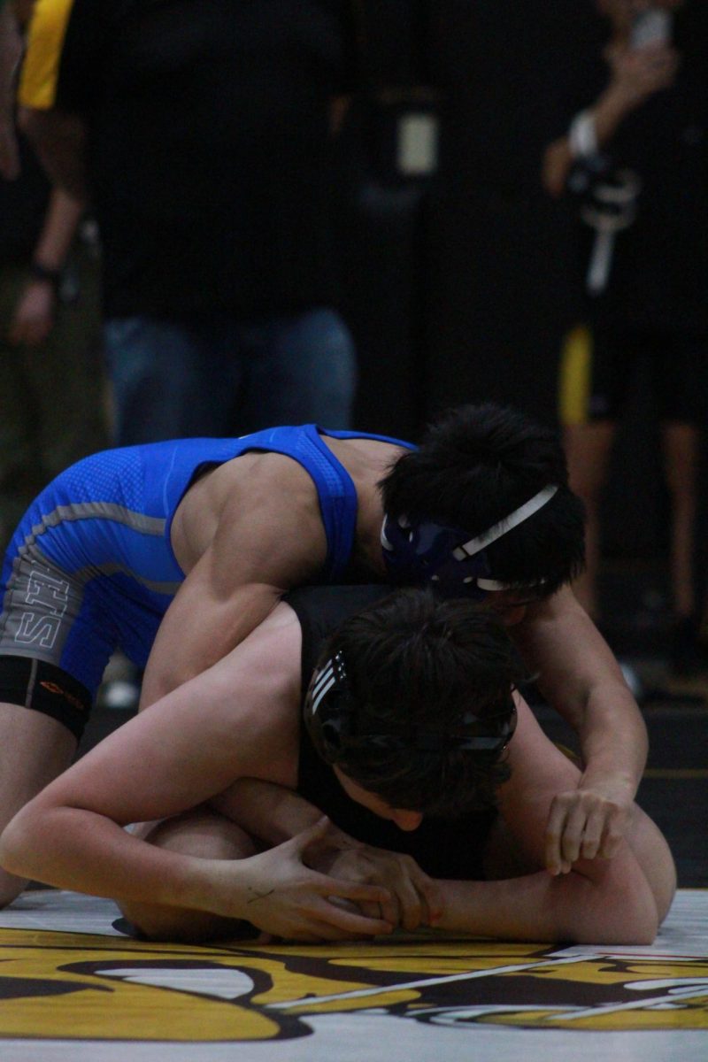 Johnny Garcia (11) wrestles at Alameda meet on Jan. 21, 2026.