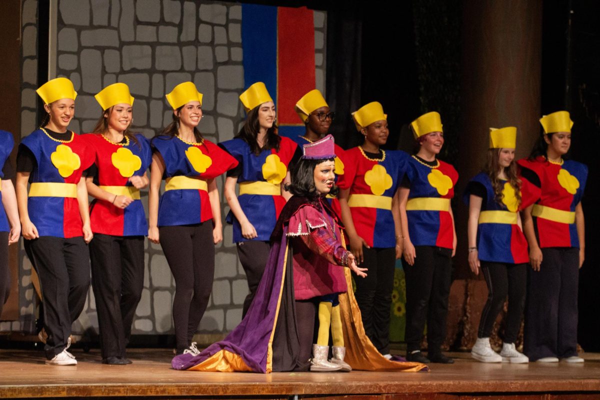 Ava Brandt performs as Lord Farquaad with  guards behind her on March 20, 2026.