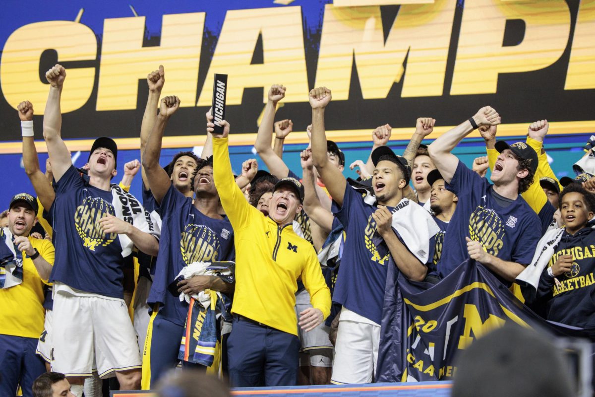 Michigan head coach Dusty May and team celebrates as March Madness champions on April 6, 2026 (Penn Live Patriot-News, MLive.com)