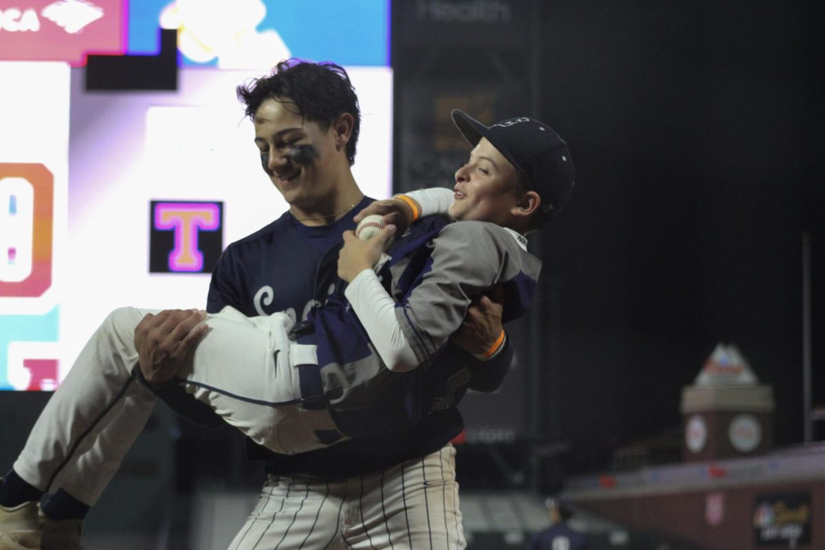 Junior Kainoa Otenbriet has a bit of fun with the Encinal ball boy.