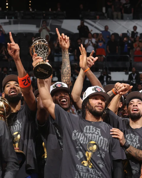 NBA Finals MVP Jalen Brunson and team celebrate their finals win over the San Antonio Spurs, and the team's first championship since 1973. (Photograph by Nathaniel S. Butler / NBAE / Getty)